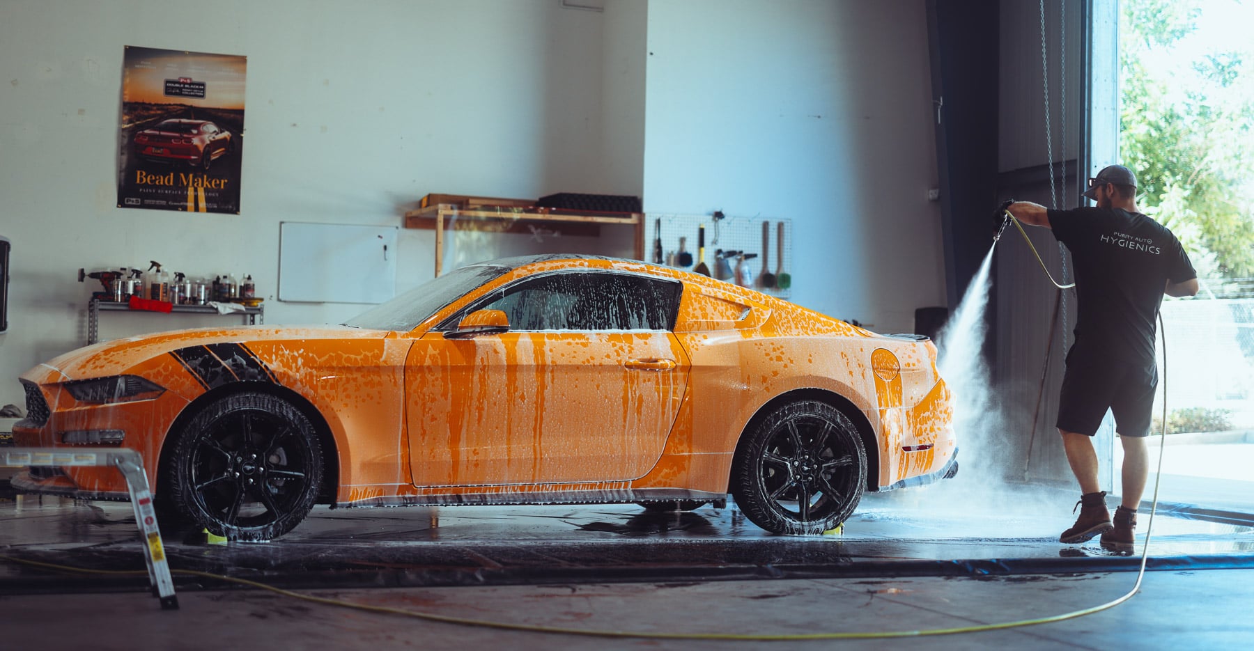 Vehicle detailing specialist at Purity auto hygienics in Yuba City offering professional hand wash membership subscriptions as a damage free car wash alternative.